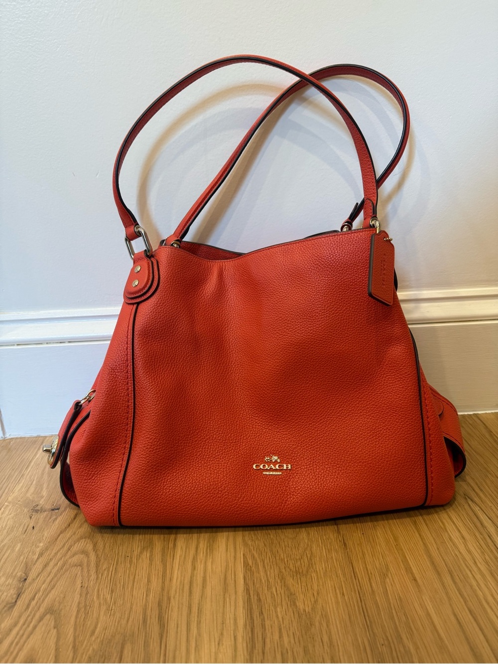 Coach Edie 31 Shoulder Bag in washed red/coral color, dust bag